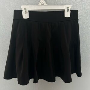 I am selling a black skort, it is a size medium, it is good for about anything.